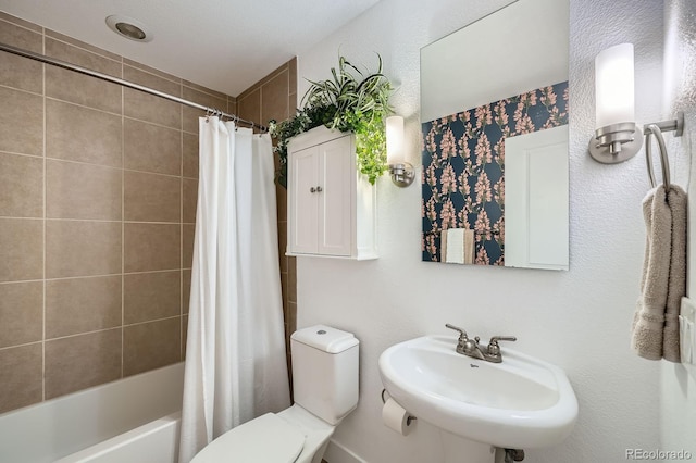 2240 N Clay St Unit 406, Denver, CO 80211 - bathroom featuring a sink, toilet, and shower / bath combo with shower curtain