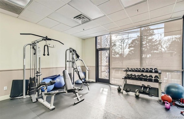 2240 N Clay St Unit 406, Denver, CO 80211 - workout area featuring a wall of windows and baseboards