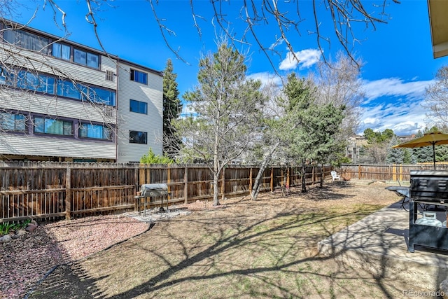 6486 Hawkeye Cir, Colorado Springs, CO 80919 - view of yard featuring a fenced backyard