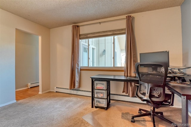 6486 Hawkeye Cir, Colorado Springs, CO 80919 - office area featuring baseboard heating, carpet flooring, and a textured ceiling