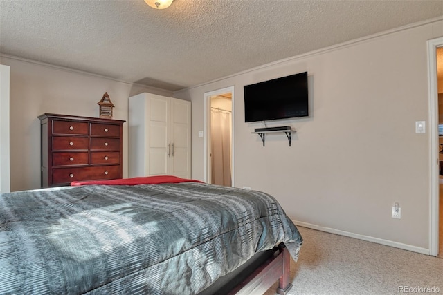 6486 Hawkeye Cir, Colorado Springs, CO 80919 - bedroom with baseboards, carpet flooring, and a textured ceiling