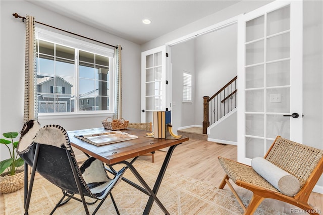 821 Boulder Peak Ave, Erie, CO 80516 - home office featuring french doors, wood finished floors, recessed lighting, and baseboards