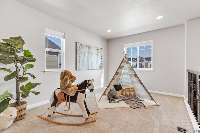 821 Boulder Peak Ave, Erie, CO 80516 - rec room with carpet floors, baseboards, and recessed lighting