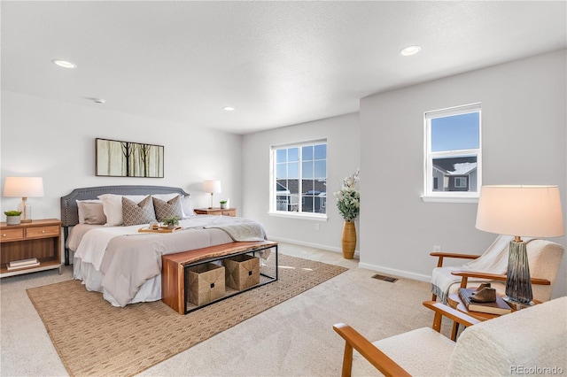 821 Boulder Peak Ave, Erie, CO 80516 - bedroom with light colored carpet, baseboards, and recessed lighting