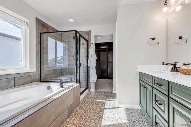 821 Boulder Peak Ave, Erie, CO 80516 - full bath featuring a stall shower, healthy amount of natural light, baseboards, and a bath