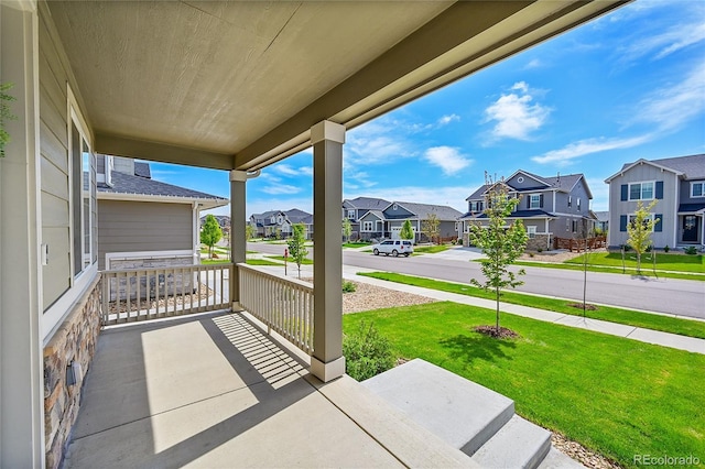 821 Boulder Peak Ave, Erie, CO 80516 - view of patio with covered porch and a residential view