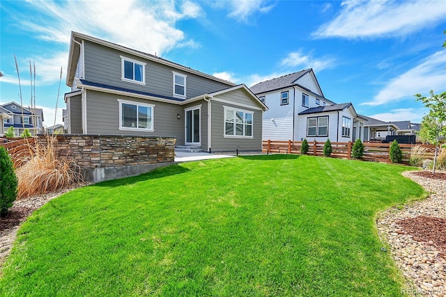 821 Boulder Peak Ave, Erie, CO 80516 - view of rear view of house