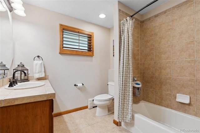 2520 Eldridge Cir, Golden, CO 80401 - full bath with tile patterned floors, vanity, shower / bath combo, and a baseboard heating unit