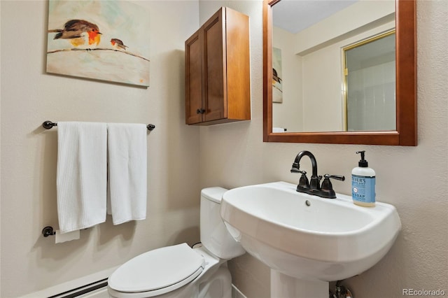 2520 Eldridge Cir, Golden, CO 80401 - bathroom with a baseboard radiator and toilet