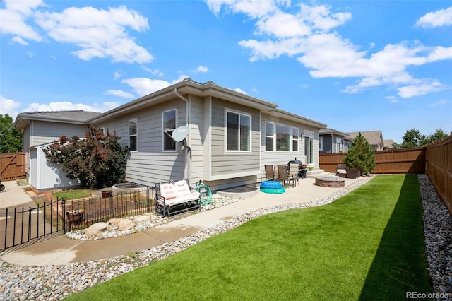11404 Hannibal St, Commerce City, CO 80022 - back of house featuring a patio area and a fenced backyard