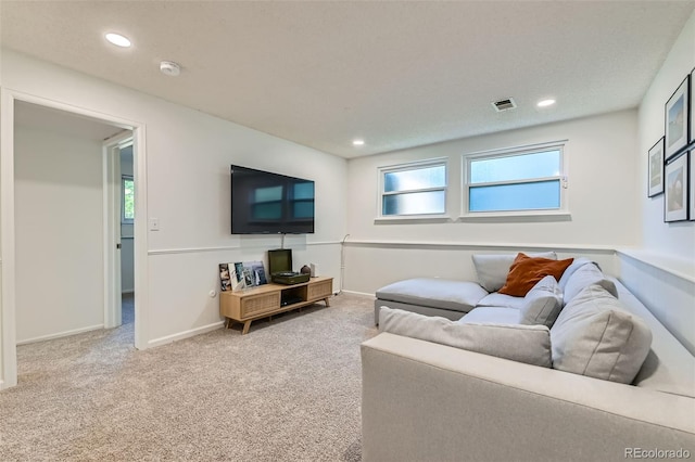 3955 S Nucla St, Aurora, CO 80013 - carpeted living room featuring recessed lighting and plenty of natural light