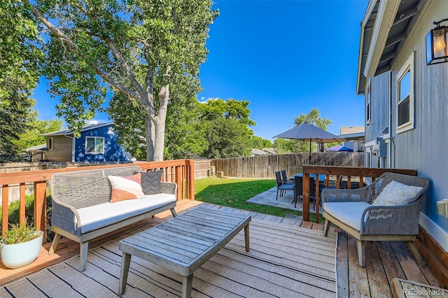 3955 S Nucla St, Aurora, CO 80013 - wooden deck featuring a fenced backyard and outdoor dining area