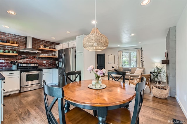 3955 S Nucla St, Aurora, CO 80013 - dining room featuring dark wood-style floors and recessed lighting
