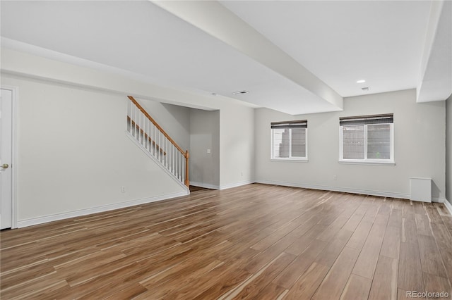 5926 S Elkhart Ct, Centennial, CO 80016 - unfurnished living room featuring stairway and wood finished floors