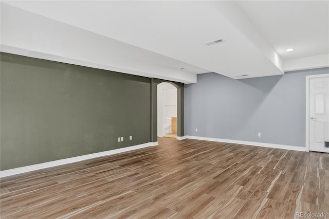 5926 S Elkhart Ct, Centennial, CO 80016 - finished below grade area with wood finished floors, arched walkways, and recessed lighting