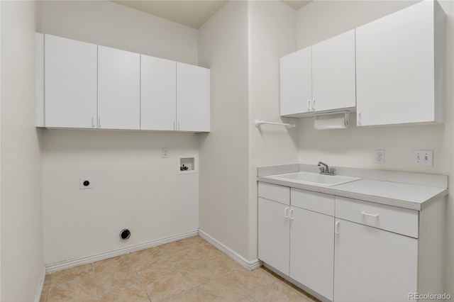 5926 S Elkhart Ct, Centennial, CO 80016 - washroom with hookup for an electric dryer, washer hookup, and cabinet space