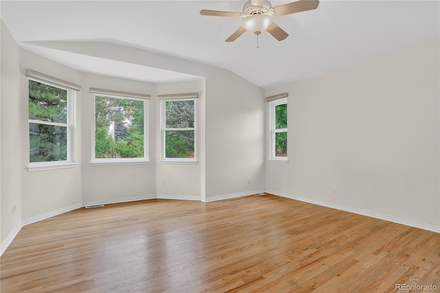 5926 S Elkhart Ct, Centennial, CO 80016 - empty room featuring light wood finished floors, ceiling fan, and vaulted ceiling
