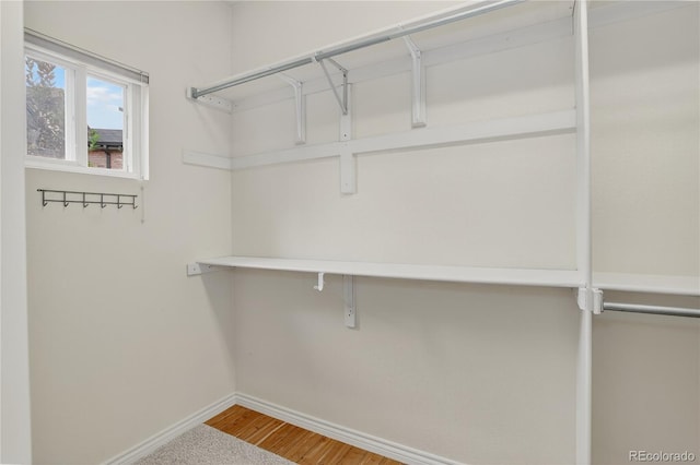 5926 S Elkhart Ct, Centennial, CO 80016 - spacious closet with wood finished floors