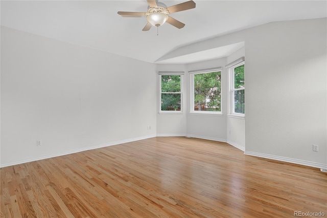 5926 S Elkhart Ct, Centennial, CO 80016 - spare room with lofted ceiling, light wood-type flooring, and a ceiling fan