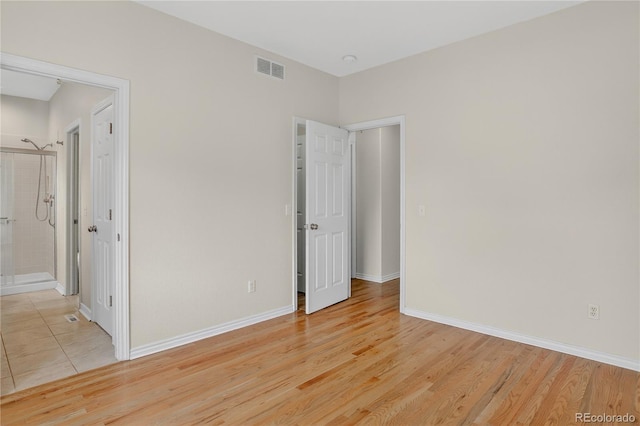5926 S Elkhart Ct, Centennial, CO 80016 - unfurnished bedroom featuring light wood-type flooring and ensuite bath