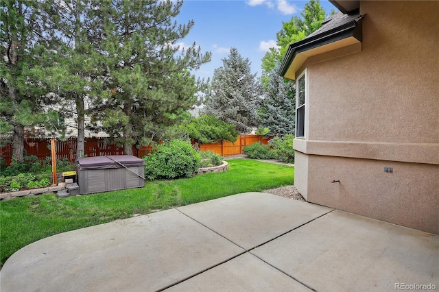 5926 S Elkhart Ct, Centennial, CO 80016 - fenced backyard featuring a hot tub and a patio area