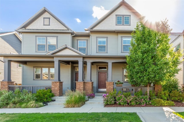 5735 Boston St, Denver, CO 80238 - craftsman house featuring covered porch
