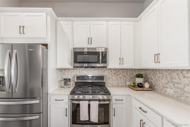 5735 Boston St, Denver, CO 80238 - kitchen with appliances with stainless steel finishes and white cabinets