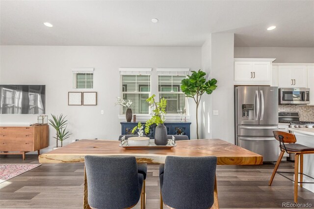 5735 Boston St, Denver, CO 80238 - dining room featuring dark wood-style floors and recessed lighting