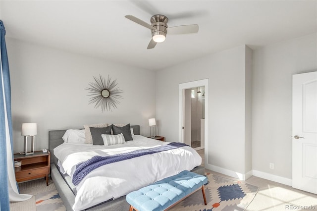 5735 Boston St, Denver, CO 80238 - bedroom featuring a ceiling fan and connected bathroom