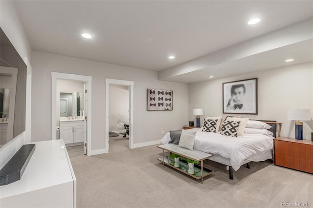 5735 Boston St, Denver, CO 80238 - bedroom featuring light carpet, recessed lighting, and ensuite bathroom