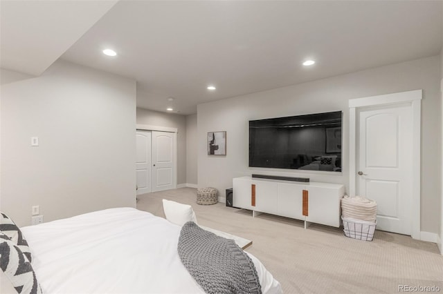 5735 Boston St, Denver, CO 80238 - bedroom featuring light colored carpet, recessed lighting, and a closet