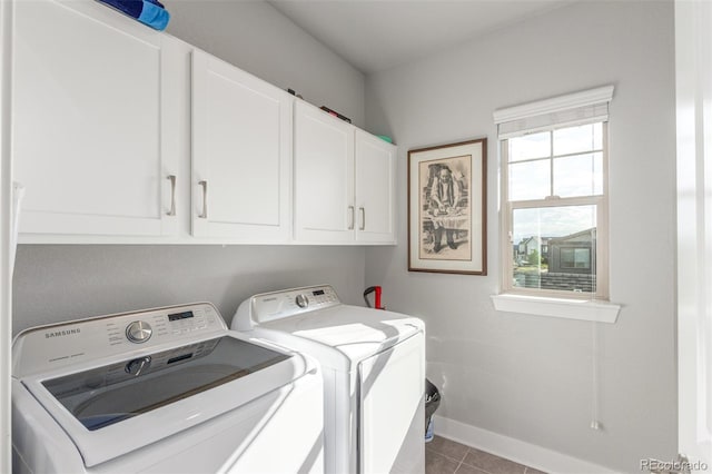 5735 Boston St, Denver, CO 80238 - washroom with cabinet space, washing machine and dryer, and tile patterned flooring