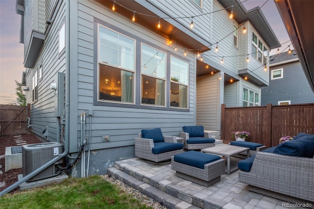 5735 Boston St, Denver, CO 80238 - fenced backyard featuring a patio area and an outdoor living space