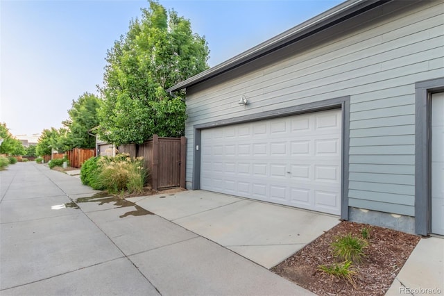 5735 Boston St, Denver, CO 80238 - garage with concrete driveway