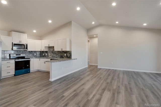 kitchen featuring backsplash, light wood-type flooring, stainless steel appliances, white cabinetry, and kitchen peninsula