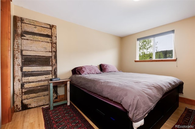 32 Magnum Bonum Dr, Breckenridge, CO 80424 - bedroom with light wood-style flooring and baseboards