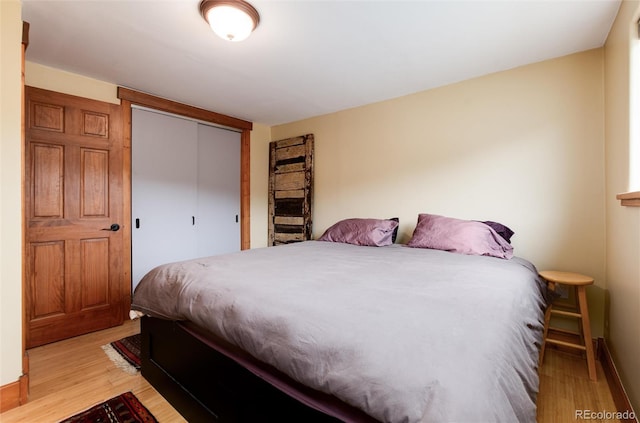 32 Magnum Bonum Dr, Breckenridge, CO 80424 - bedroom featuring light wood-style floors, baseboards, and a closet