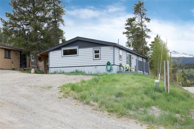 32 Magnum Bonum Dr, Breckenridge, CO 80424 - view of front of house featuring dirt driveway