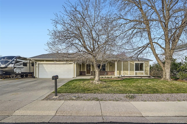 view of front of house with an attached garage, driveway, a porch, brick siding, and a front yard