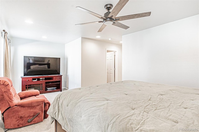 carpeted bedroom featuring ceiling fan