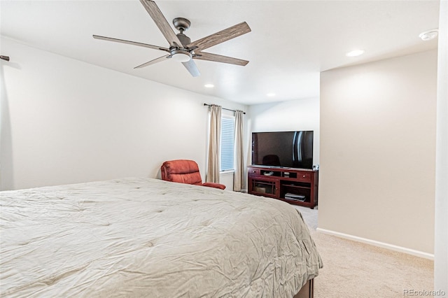 carpeted bedroom featuring ceiling fan