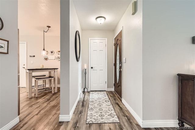 6238 S Cherry Cir, Centennial, CO 80121 - hallway with baseboards and wood finished floors