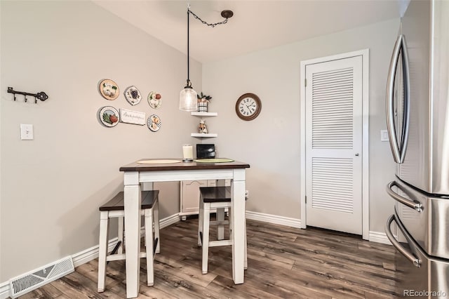 6238 S Cherry Cir, Centennial, CO 80121 - dining space with baseboards, dark wood-type flooring, and visible vents