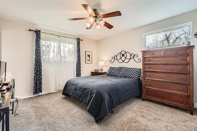 6238 S Cherry Cir, Centennial, CO 80121 - bedroom with light colored carpet and ceiling fan