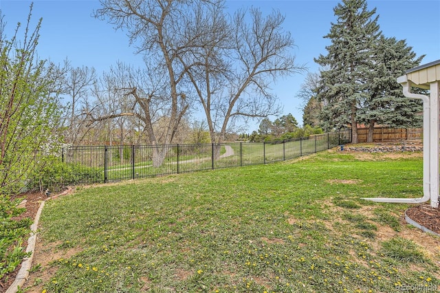 6238 S Cherry Cir, Centennial, CO 80121 - view of yard featuring a fenced backyard