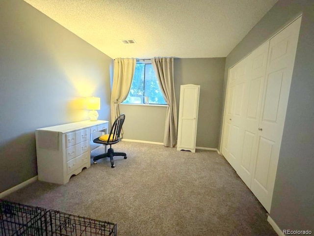12546 E Cornell Ave Unit 104, Aurora, CO 80014 - carpeted home office featuring a textured ceiling and baseboards
