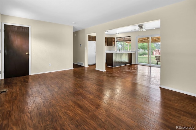 4559 Ashfield Dr, Boulder, CO 80301 - unfurnished living room featuring ceiling fan and dark wood-type flooring