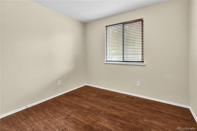 4559 Ashfield Dr, Boulder, CO 80301 - empty room featuring baseboards and wood finished floors