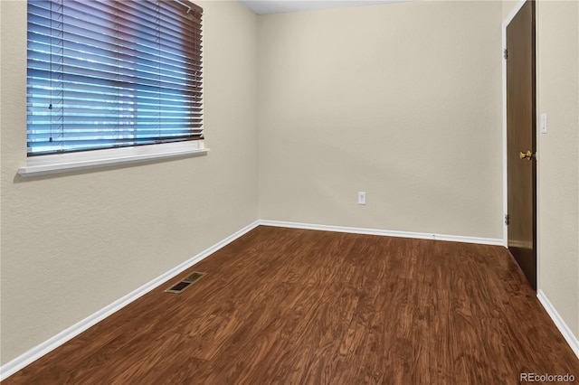 4559 Ashfield Dr, Boulder, CO 80301 - spare room with dark wood finished floors and baseboards