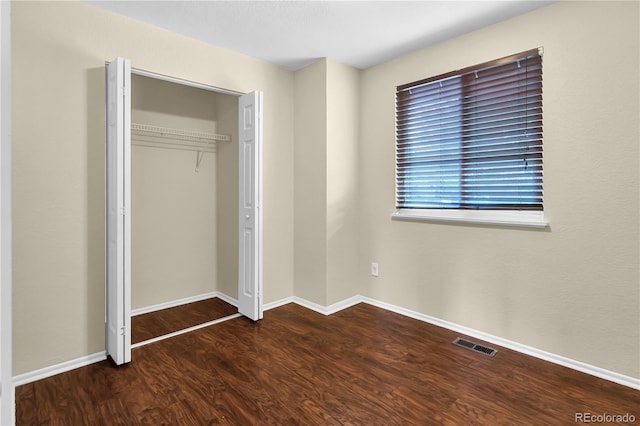 4559 Ashfield Dr, Boulder, CO 80301 - unfurnished bedroom with wood finished floors and a closet